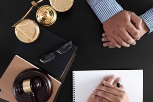 Businessman shaking hands Judge gavel with Justice lawyers trust Promise Win the Case